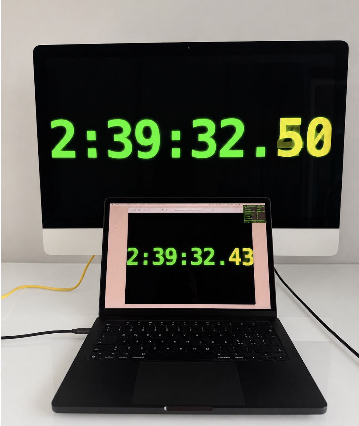 MacDisplay Clock Test in the opposite direction: 2017 Retina 5K iMac as source and M4 Pro MacBook Pro as monitor, approximately 70 ms visible offset